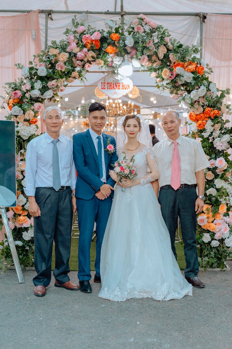 Bride And Groom With Their Parents