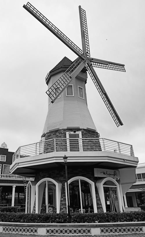 Free Building with Windmill in Town Center Stock Photo