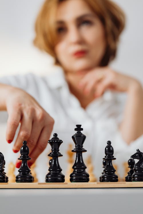 A Woman Playing Chess 
