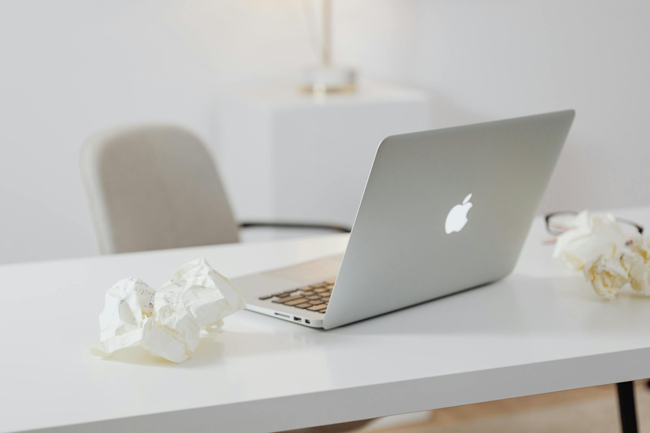 Silver Macbook on White Table · Free Stock Photo
