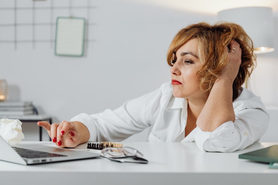 frustrated job seeker looking at computer screen showing job requirements - how hard is it to get entry level paralegal job frustrated job seeker looking at computer screen showing job requirements - how hard is it to get entry level paralegal job
