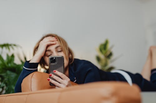 Woman Using an Iphone 11 