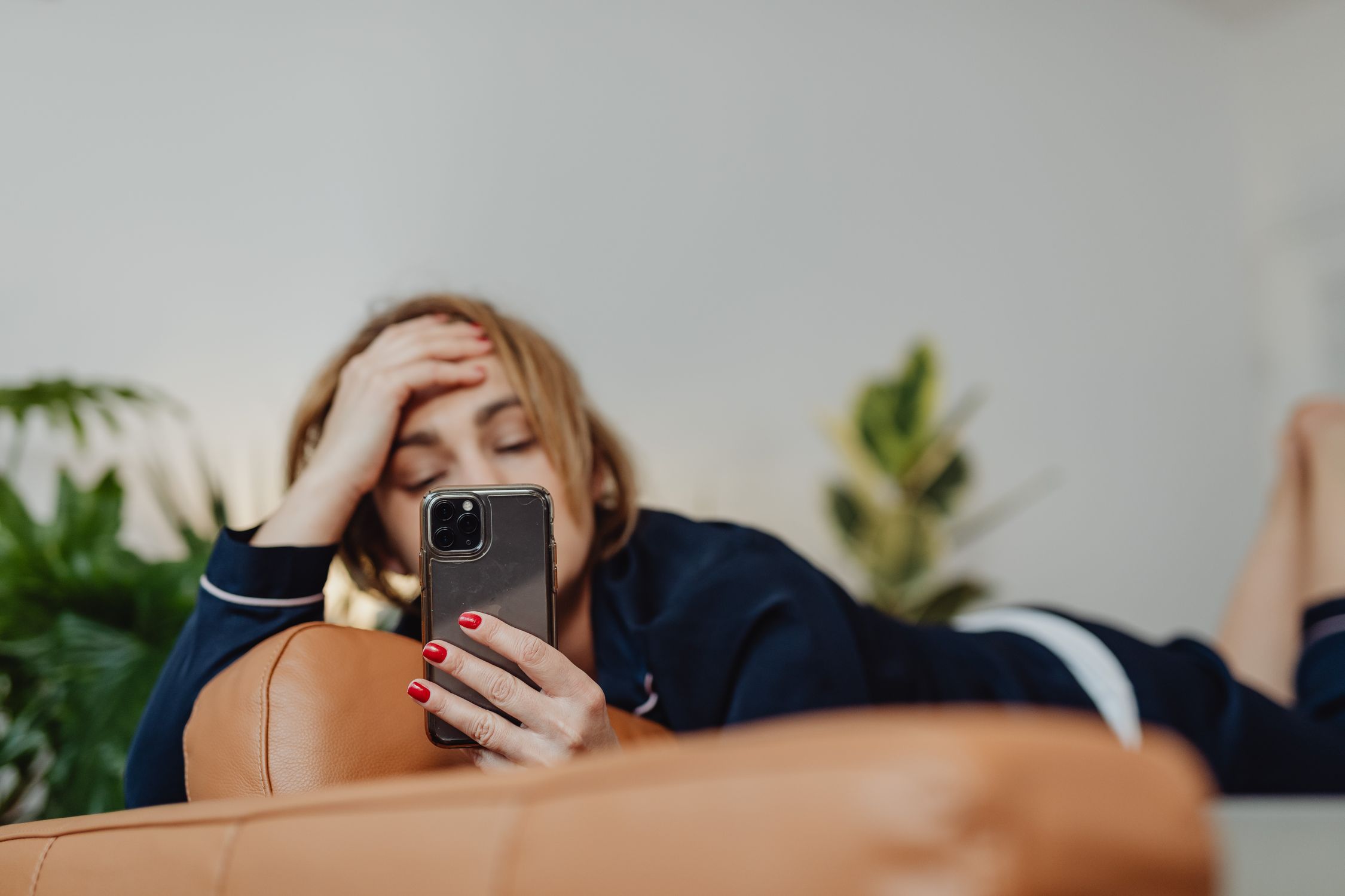 Female Using Iphone Woman Using an Iphone 11 · Free Stock Photo
