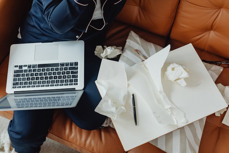 A Laptop On Person's Lap