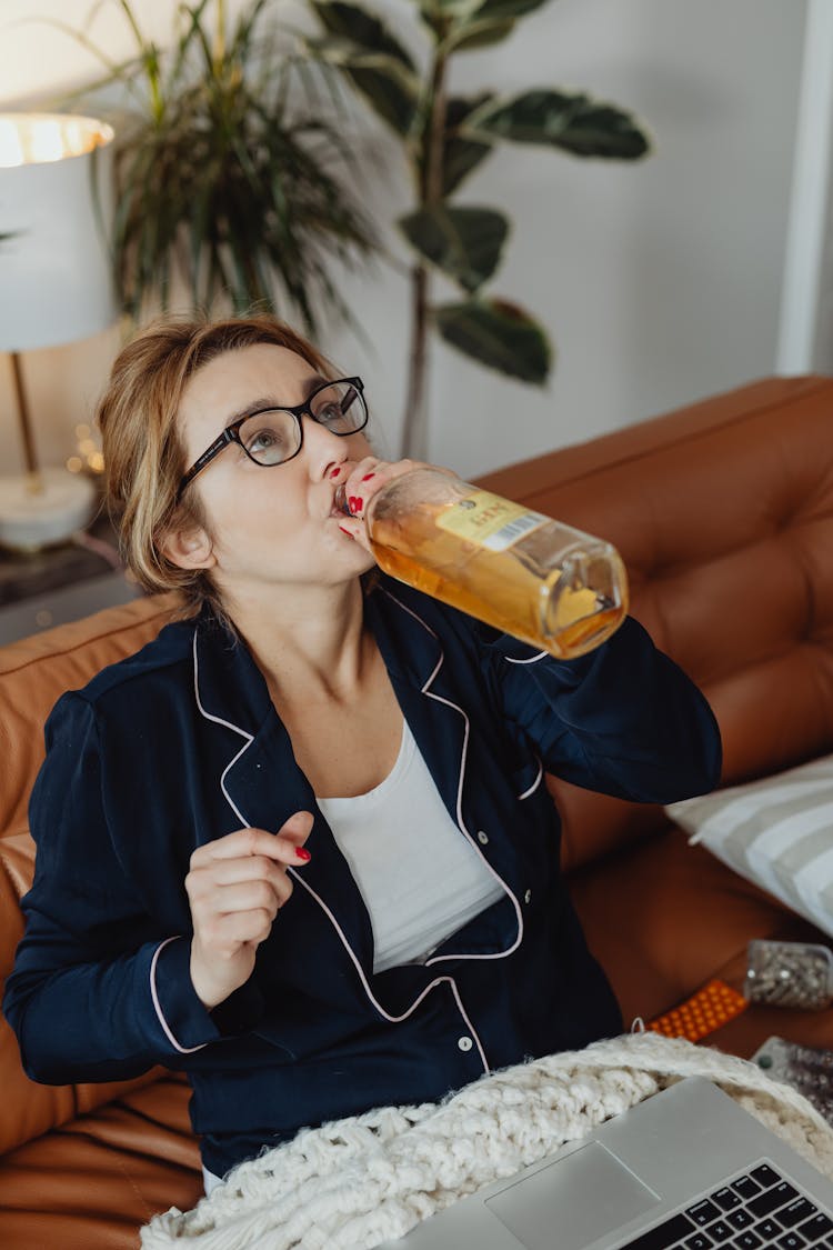 A Woman Drinking Liquor