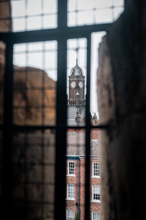 Clock Tower Seen Through a Window