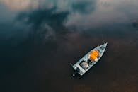 Fishing boat with equipment anchored in calm sea