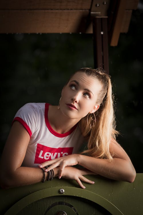 A Woman in Red and White Shirt