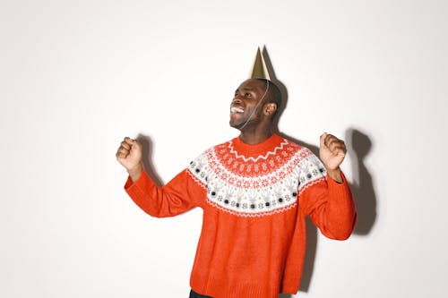 Man in Red Sweater Celebrating