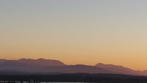 Ingyenes stockfotó hegyek, hegylánc, naplemente témában