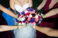 A Bride and Bridesmaids Holding the Bridal Bouquet