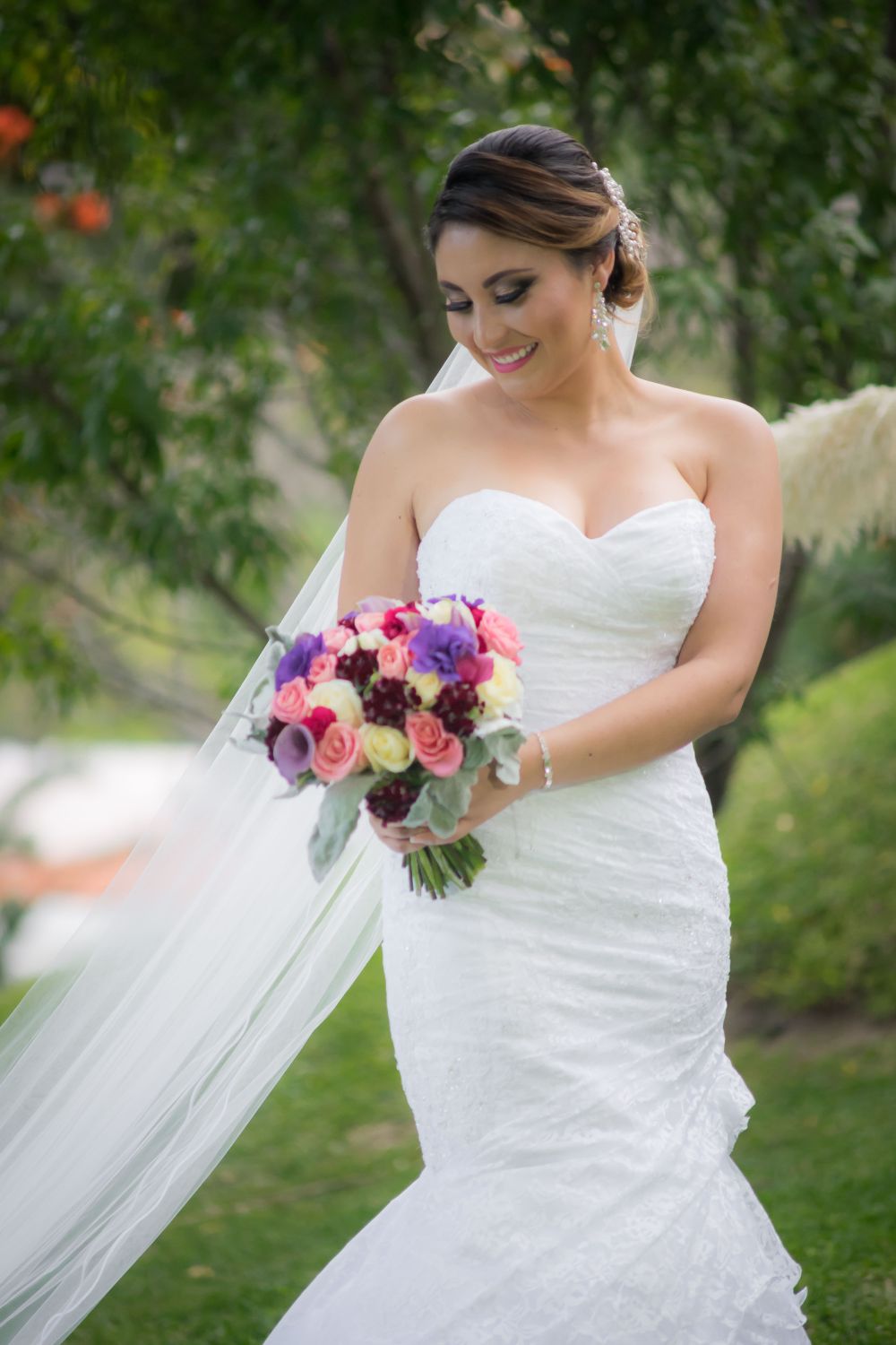 Woman in White Dress Holding Bouquet of Flowers · Free Stock Photo