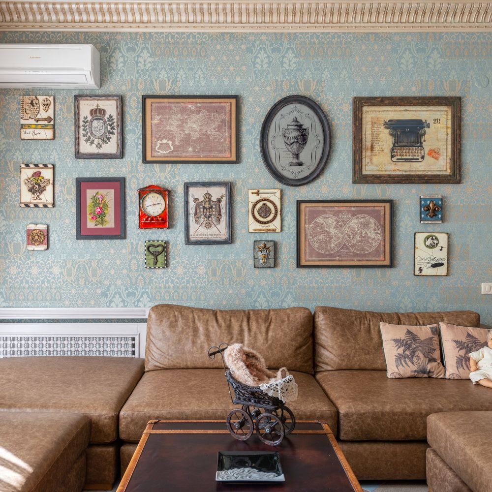 Wallpapering in Twickenham — a decorator at work mid-project