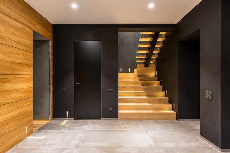 Modern Spacious Corridor With Wooden Staircase