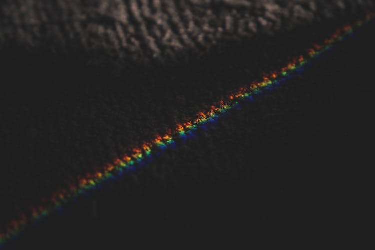 Rainbow Stripes Of Prism Light On Carpet