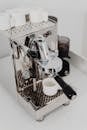 A Close-Up Shot of a Silver Espresso Machine