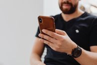 Bearded Man Holding an Iphone Xs Max