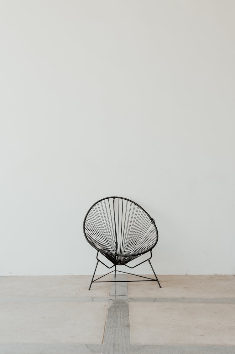 Black Chair In Empty Room