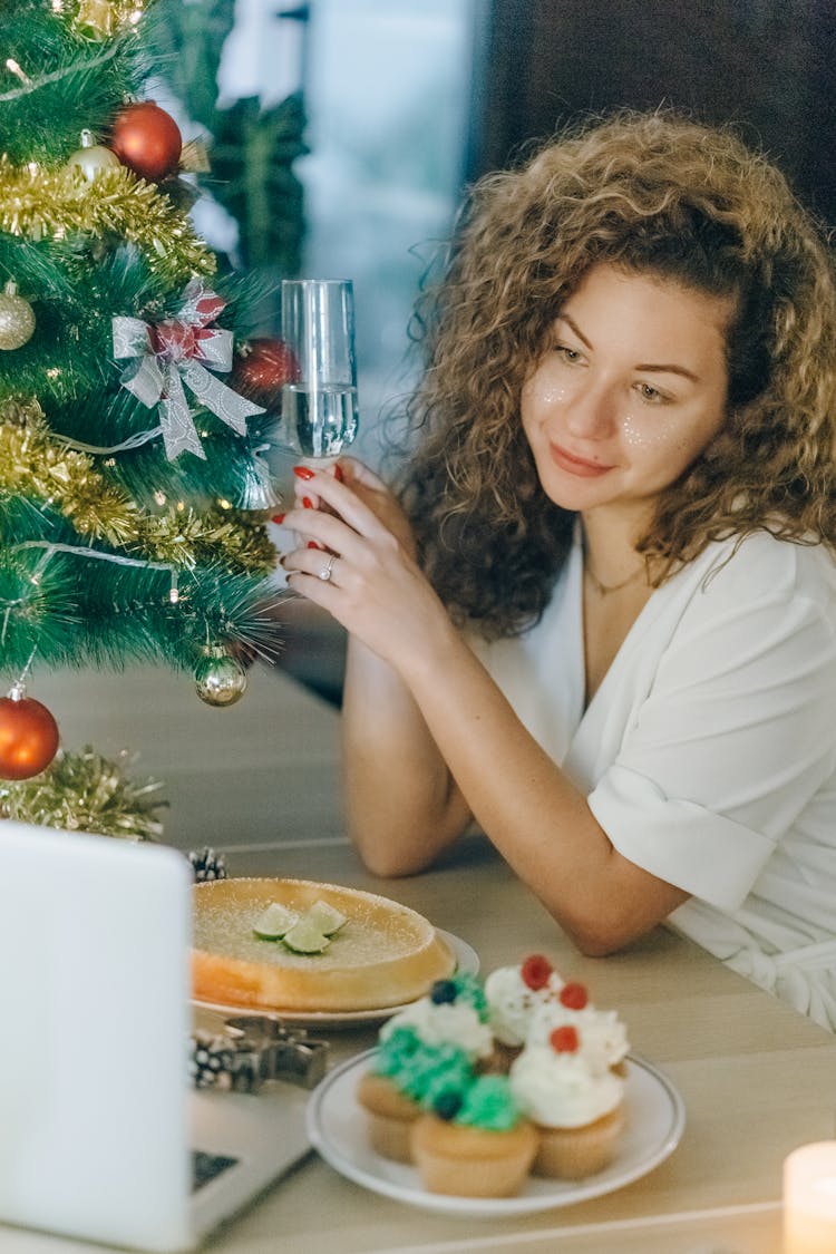 Woman In White Shirt Having A Video Chat