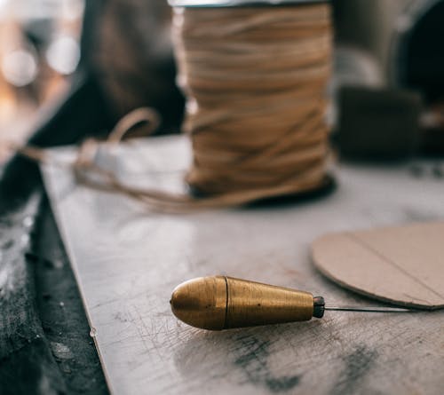 Awl on working bench in workshop