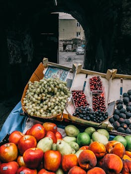 Vibrant display of fresh fruits at a street market in Istanbul, Turkey.