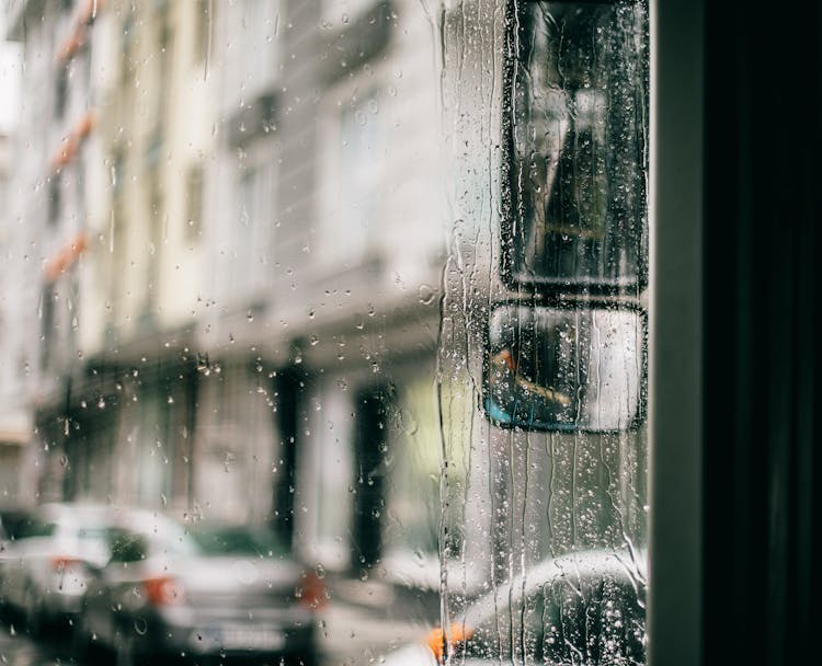 Wet Windscreen Of Bus In Rainy Day