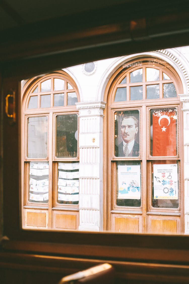 Brown Wooden Framed Glass Windows