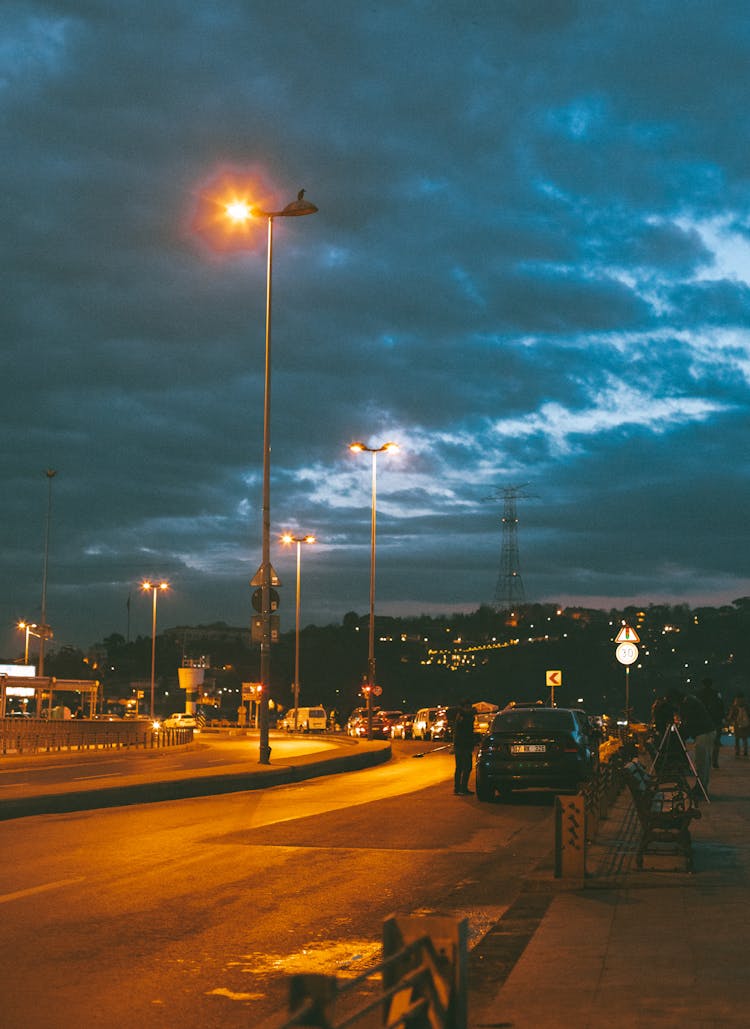 Road With Streetlamps At Night