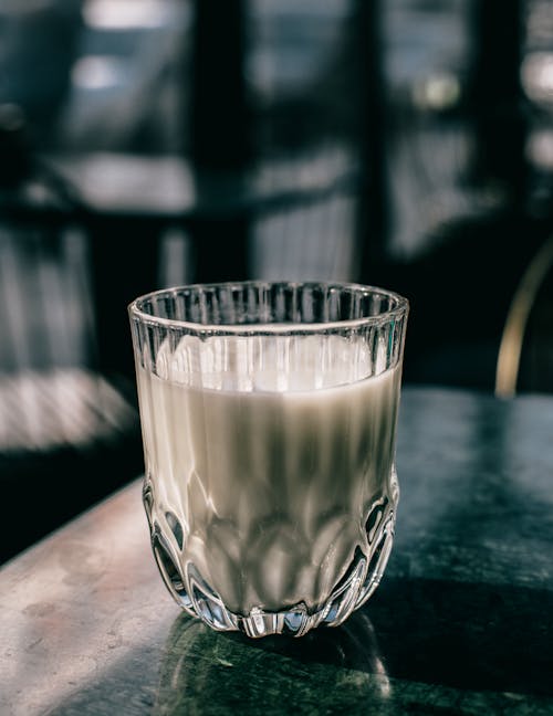 Clear Drinking Glass With White Liquid