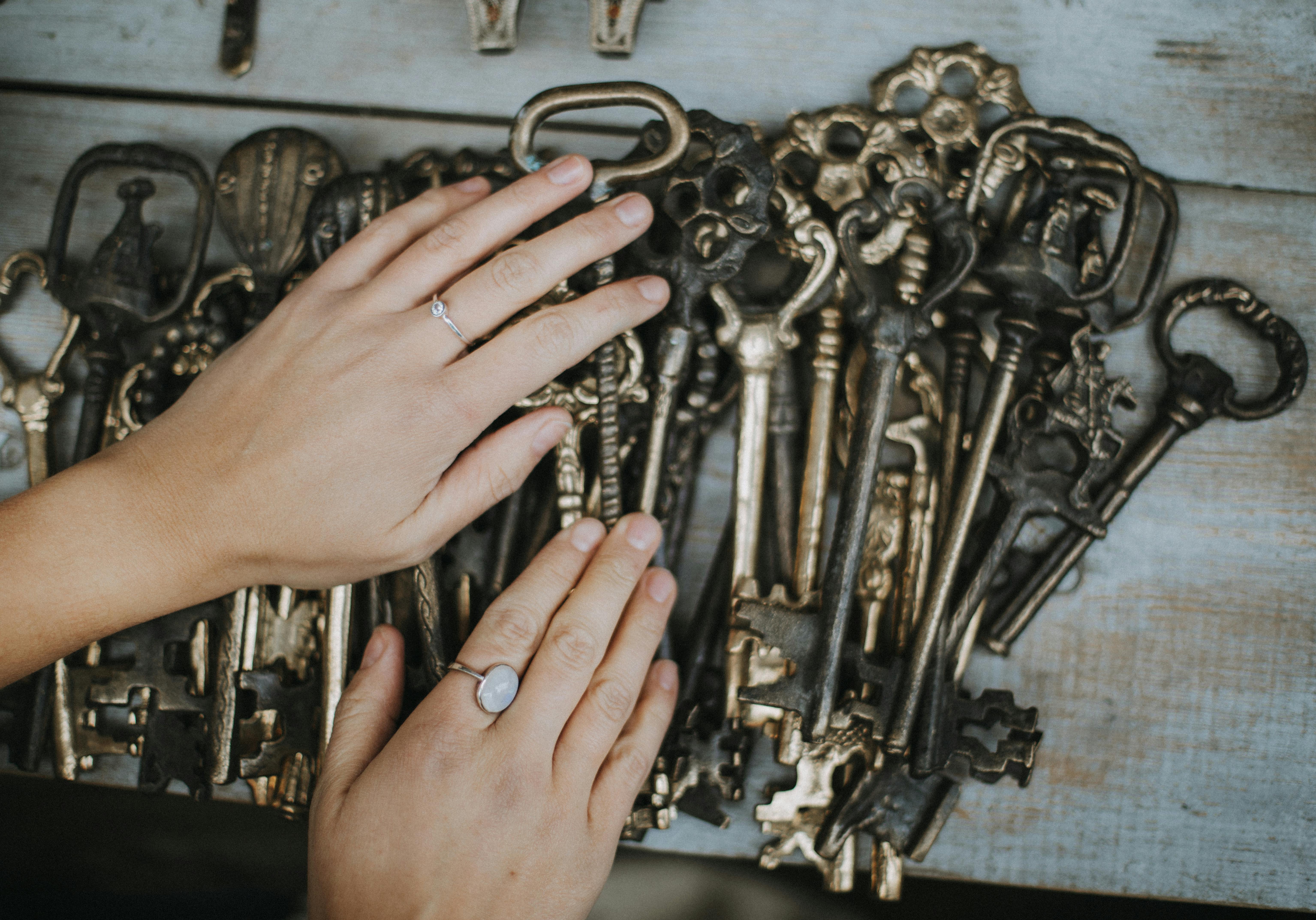 person holding a big skeleton keys