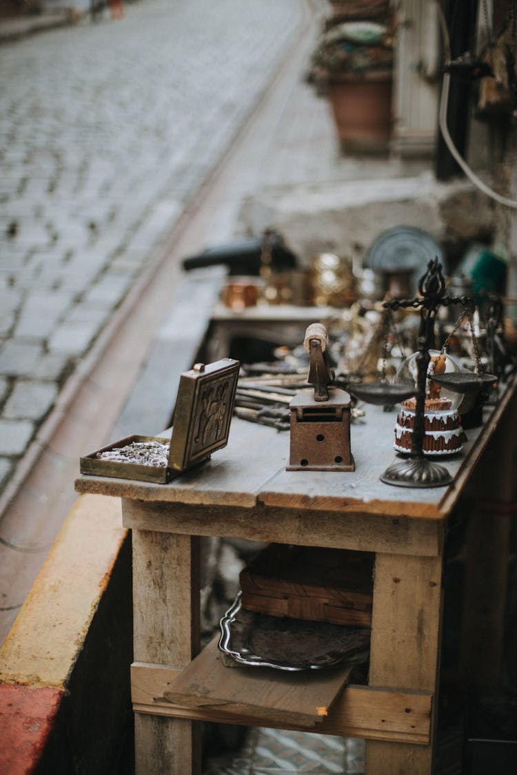 Assorted Antique Items On Wooden Table