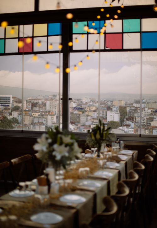 Free Beautifully decorated table at a restaurant overlooking Istanbul's cityscape, perfect for celebrations. Stock Photo