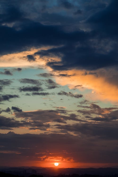 Free Gray Clouds and Blue Sky During Sunset Stock Photo