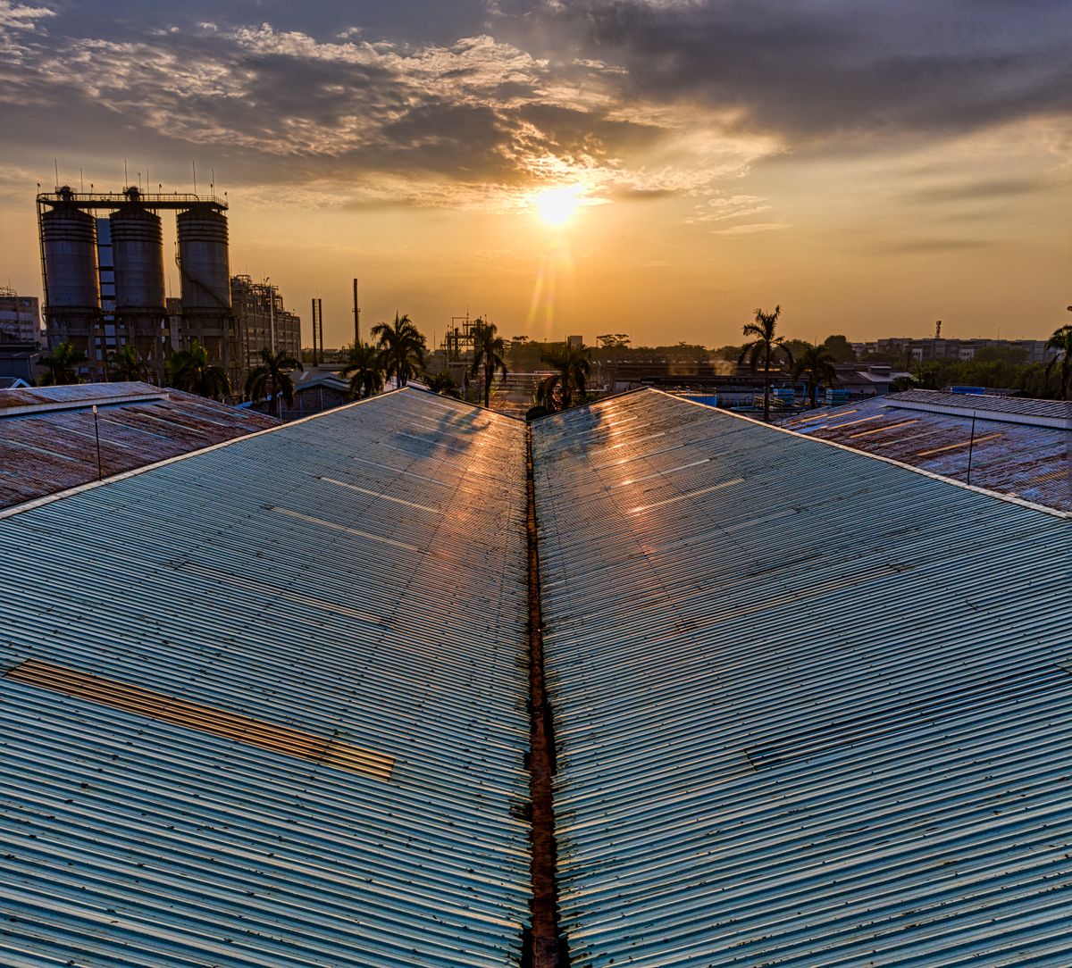 Commercial industrial building with a large metal roof