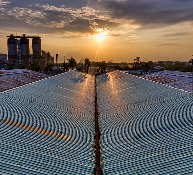 Metal Roof On Modern Factory On Sunset