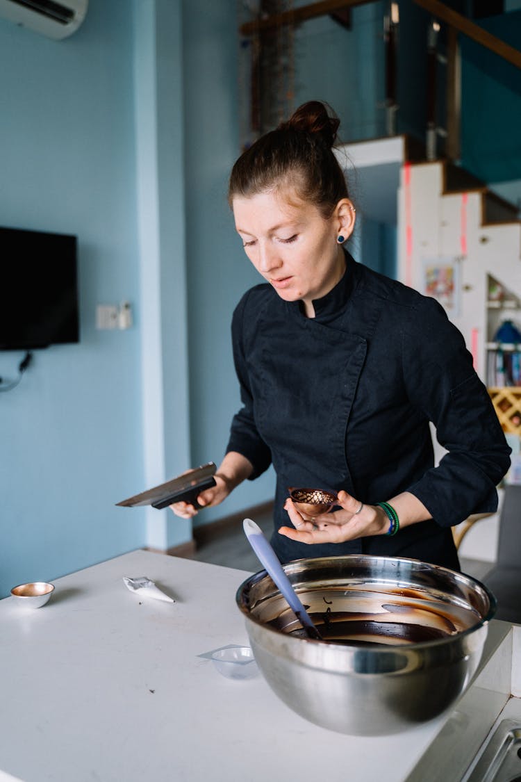 A Woman In Black Chef Jacket