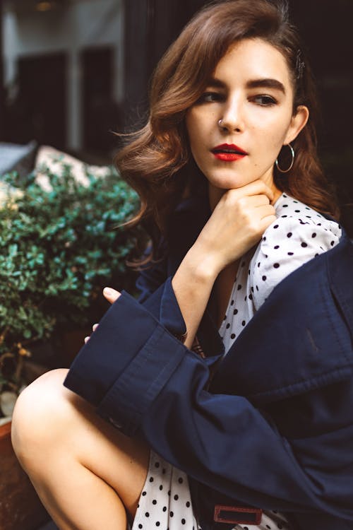 Portrait of a Young Brunette Woman with a Nose Ring 