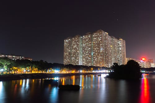 Illuminated Buildings in City at Night