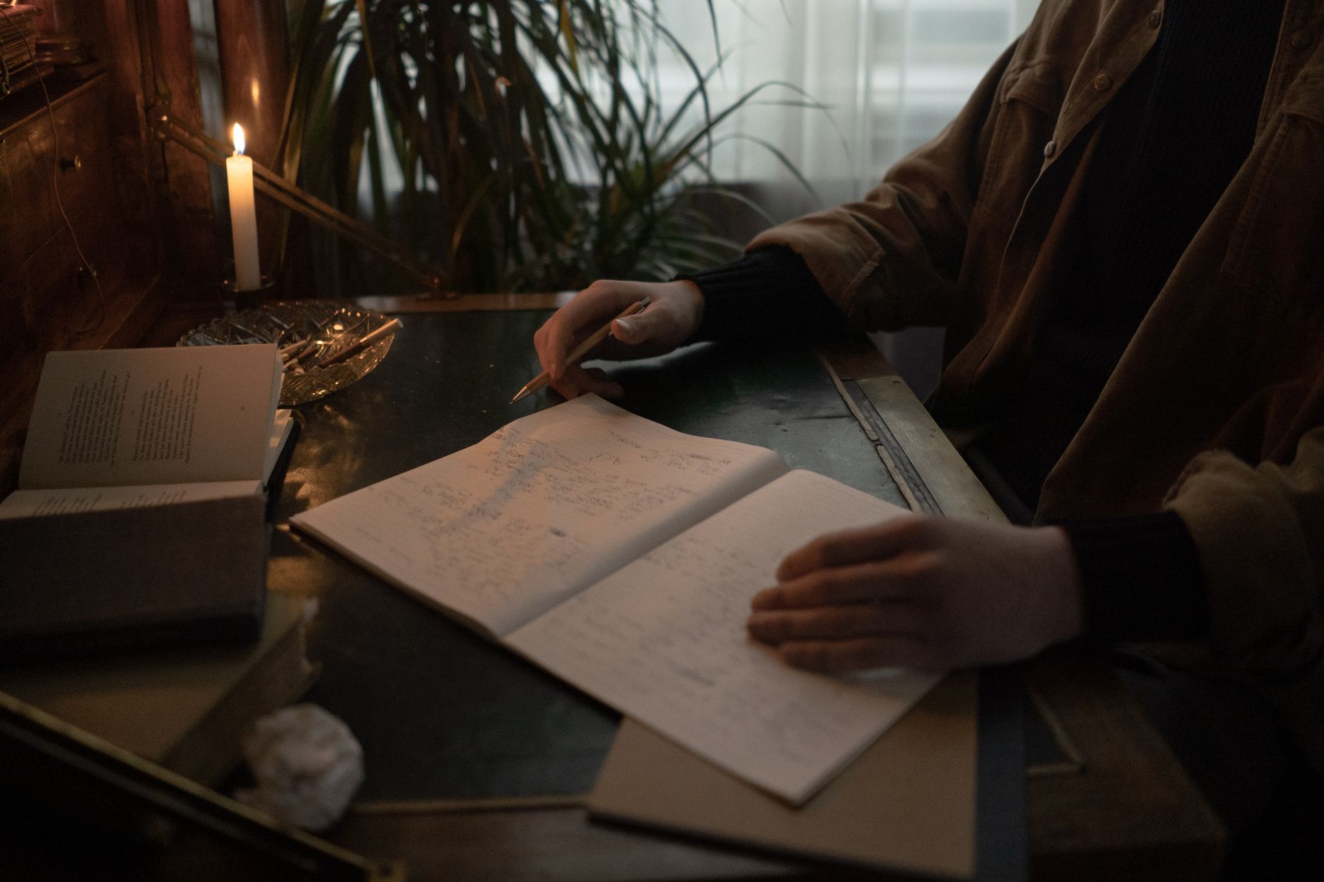 ADHD analysis paralysis focus & productivity adhd — person writing in journal cozy desk setup warm lamp light calm organized
