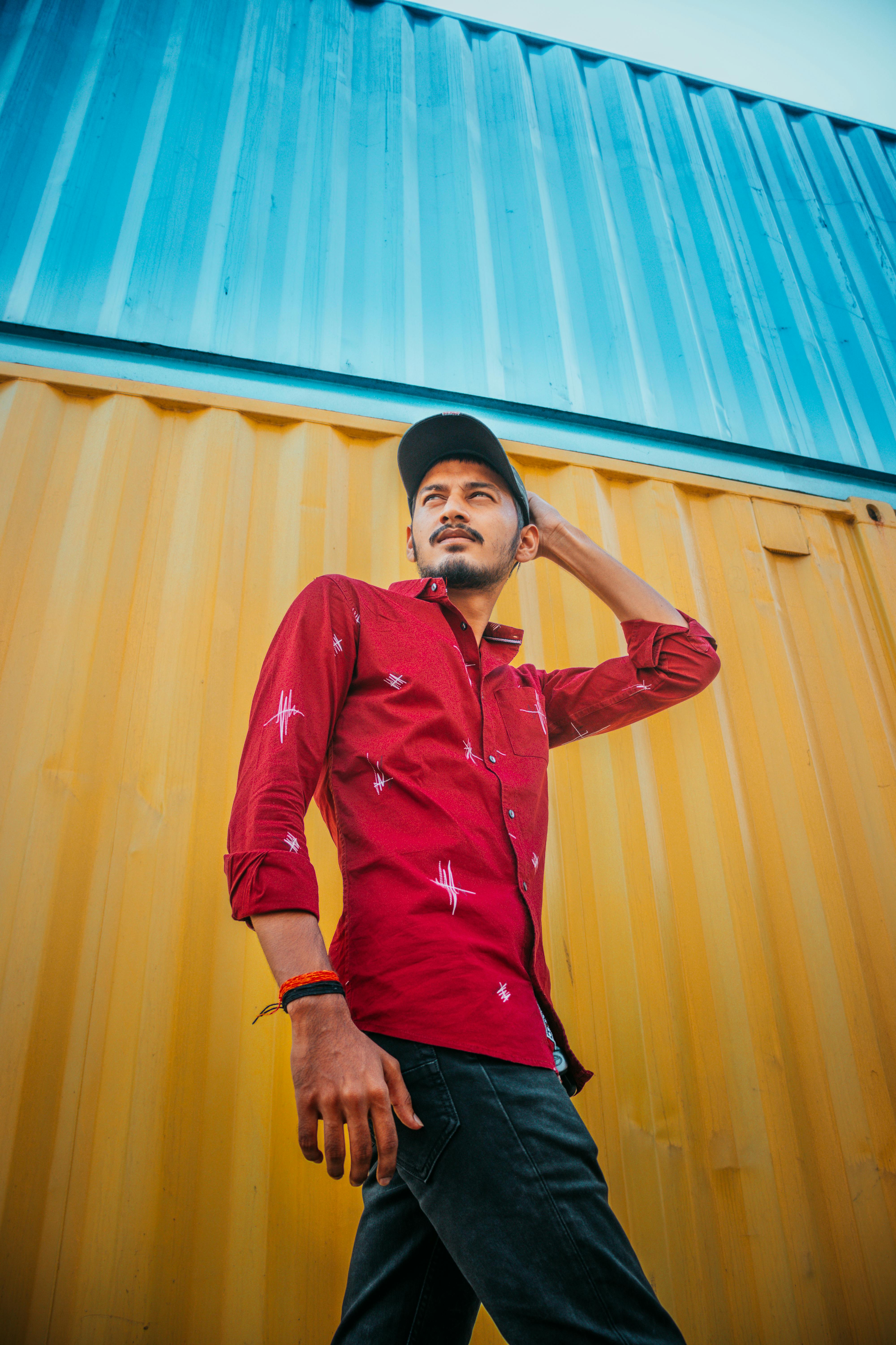 red dress shirt with blue pants