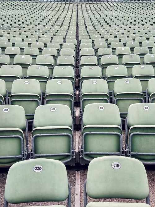 Free Rows of green empty stadium seats in Bregenz, Austria, creating a repetitive pattern. Stock Photo