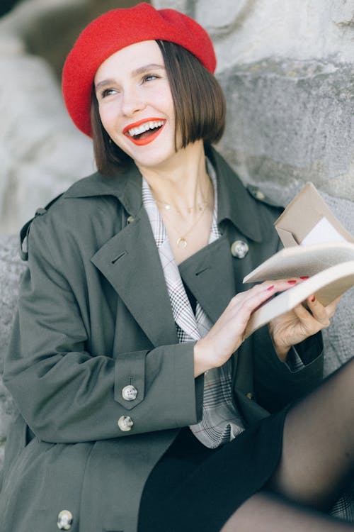 Woman in Gray Coat and Red Hat
