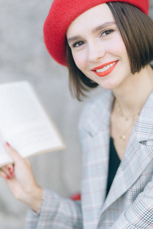 Beautiful Woman Holding an Open Book