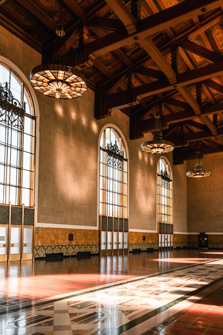 Spacious Ticket Lobby Of Aged Railway Station With Classy Interior