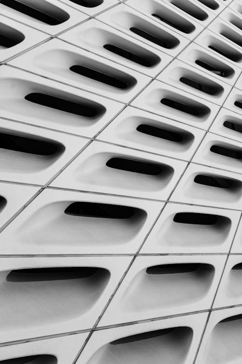 From below of black and white fragment of geometric building of The Broad contemporary art museum located in Los Angeles downtown