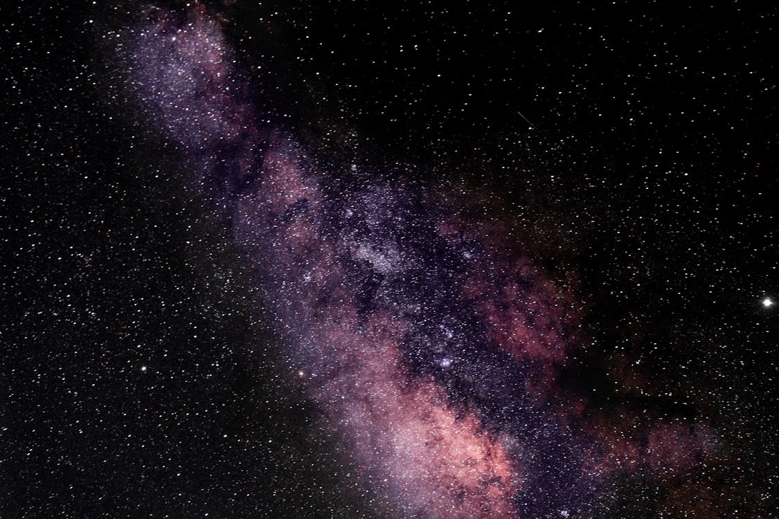 Free Universe filled with stars nebula and glowing Milky Way Stock Photo