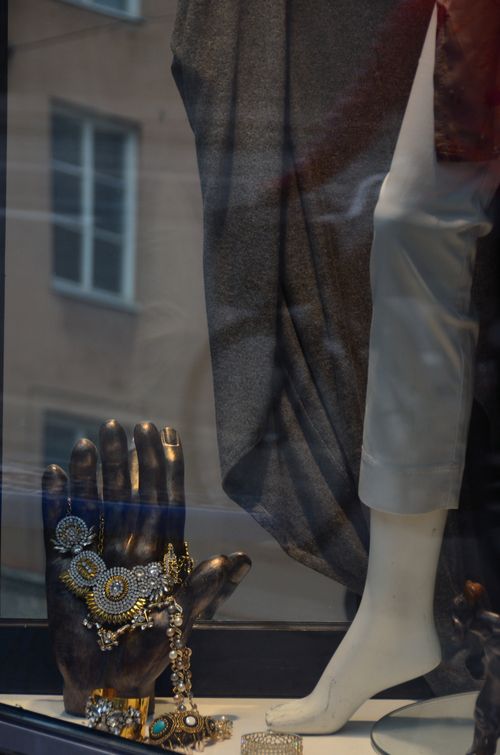 Free Elegant jewelry showcased in a Stockholm store window on a mannequin hand. Stock Photo