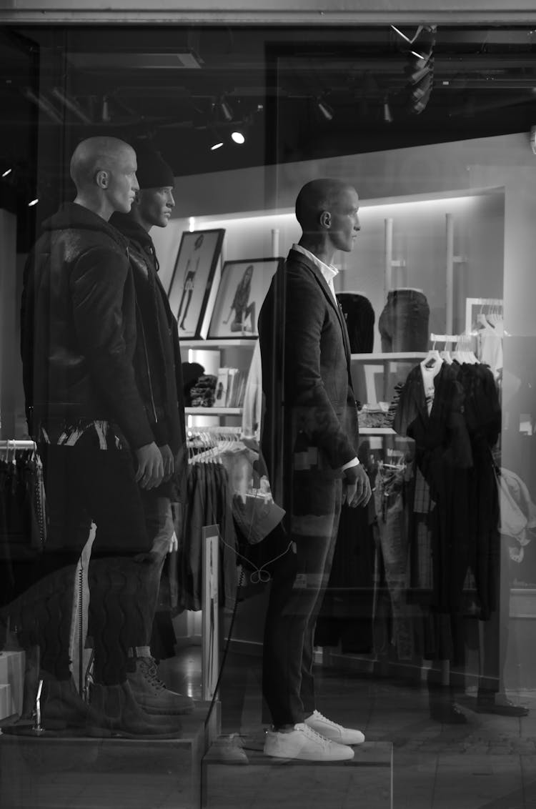 Mannequins In A Menswear Store Window 