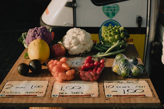 Colorful assortment of vegetables and fruits on a market table in Maastricht, Netherlands.