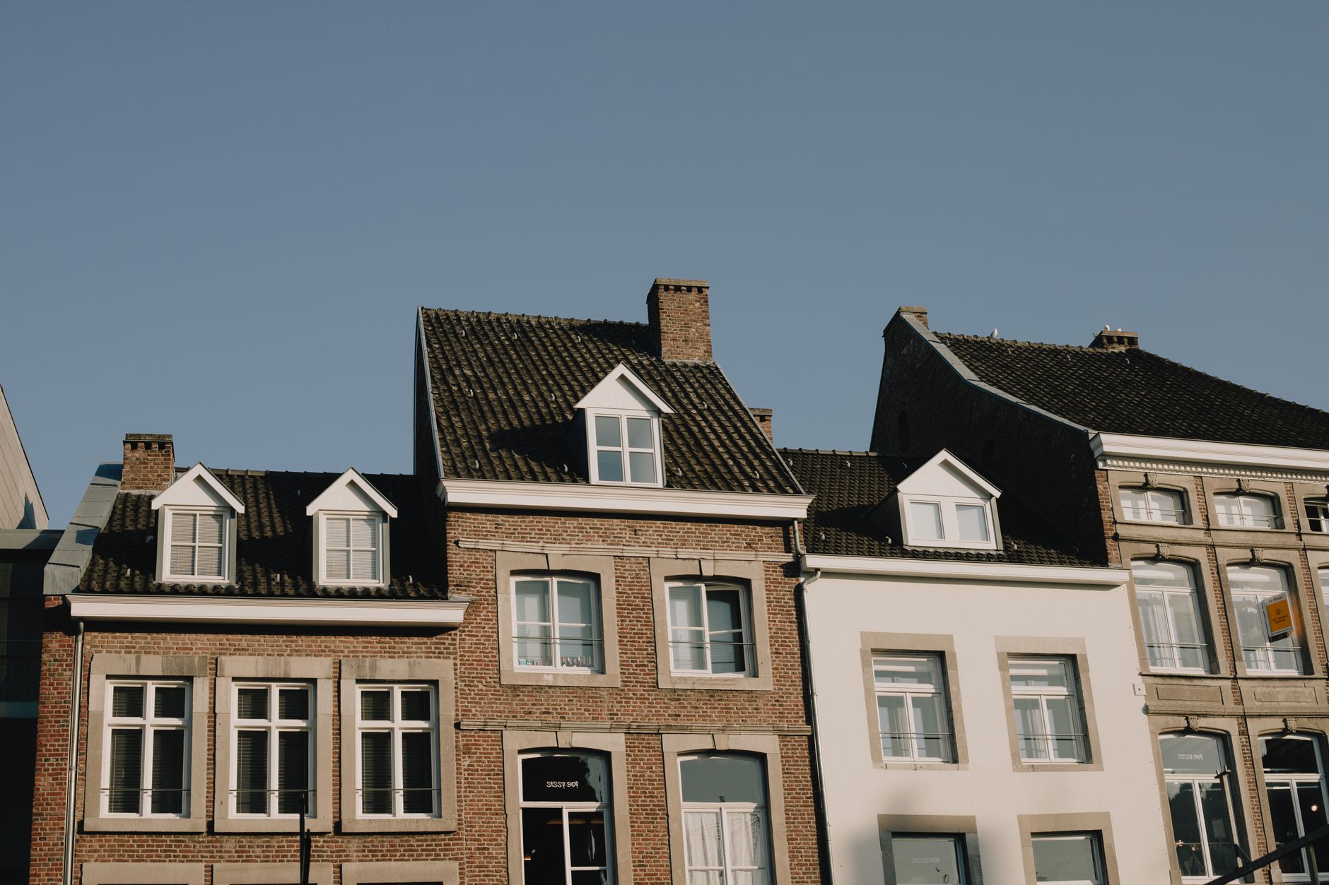 Historic Dutch architecture captured in a sunny day in Maastricht, Netherlands.